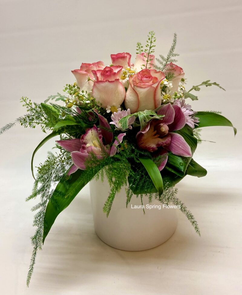 Arrangement with orchids and roses